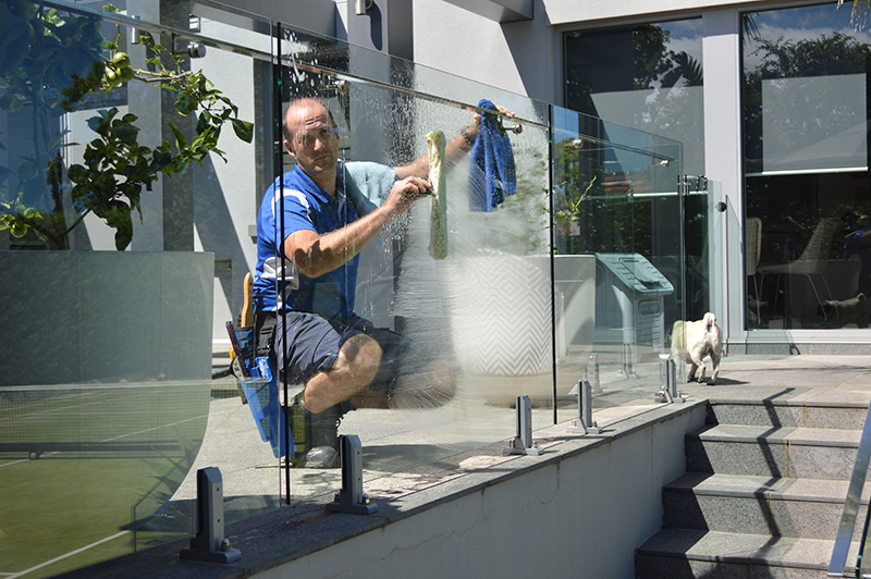 Cleaning poolside glass